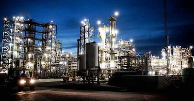 REC Silicon’s silane and fluidized bed reactor polysilicon plant in Moses Lake, Washington with vehicle at night