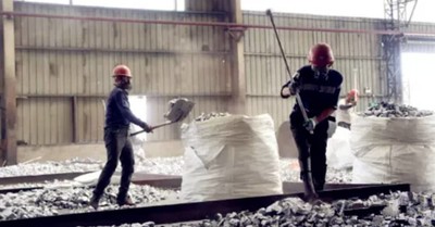 Workers manually crush silicon metal in the Jingang Circular Economy Industrial Park in Yili (also known as Ili) prefecture, Xinjiang, China